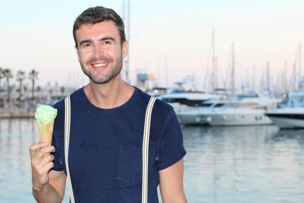 istock Happy man holding an ice cream 847419168