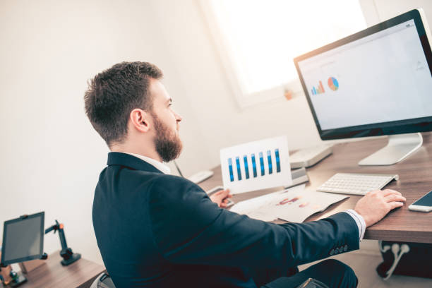 istock Young Businessmen on His Office Desk During Working Day 847429236