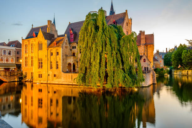 istock Bruges (Brugge) cityscape with water canal at sunset 847429596