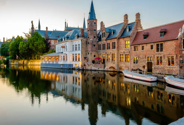 istock Bruges (Brugge) cityscape with water canal at sunset 847429608