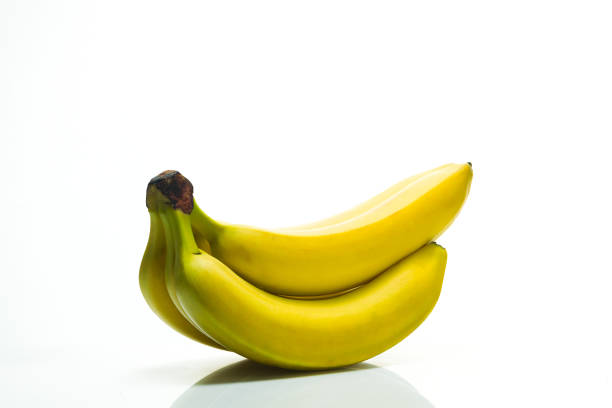 istock Bunch of ripe bananas on a white background 847435346