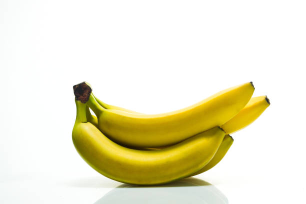 istock Bunch of ripe bananas on a white background 847435552