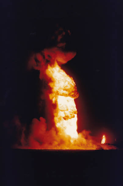 istock Oil well fires burning in field, Kuwait 847435858