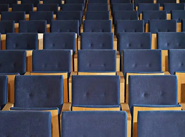 Photo of Rows of empty seats in conference room