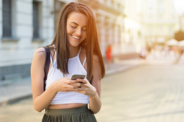 istock Sweet girl using a phone 847449302