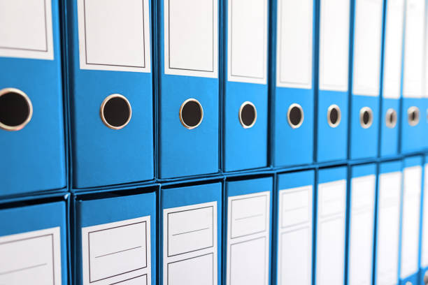 istock Binder folders in shelf, binders in a row. 847465978