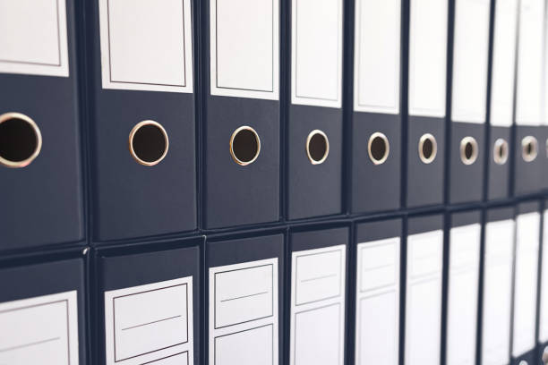 istock Binder folders in shelf, binders in a row. 847466808