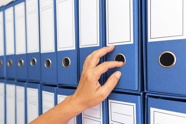 istock Female accountant archiving business documentation 847469582