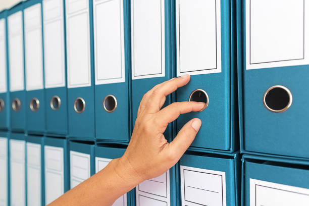 istock Female accountant archiving business documentation 847470078