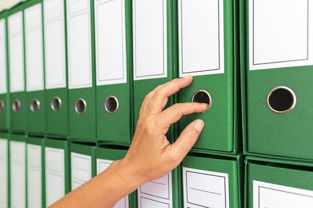 istock Female accountant archiving business documentation 847472478