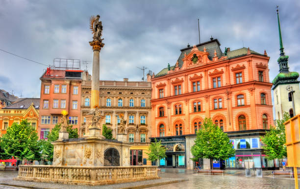 The Plague Column on Freedom Square in Brno, Czech Republic The Plague Column on Freedom Square in Brno - Moravia, Czech Republic former czechoslovakia stock pictures, royalty-free photos & images