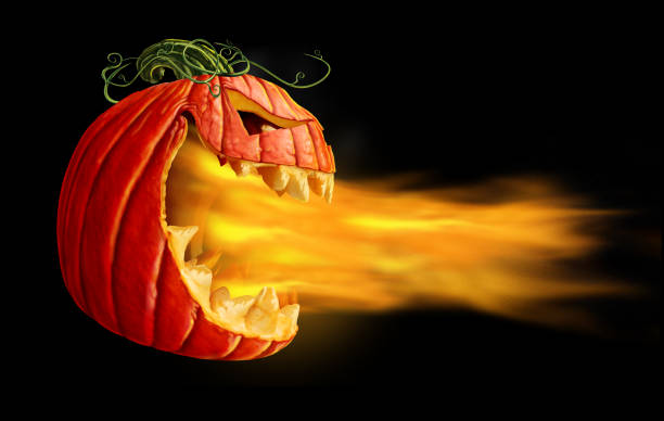 Pumpkin Flames On Black Pumpkin flames on a black background as demon fire blaze scary jack o lantern character in a side view  feirce stock pictures, royalty-free photos & images