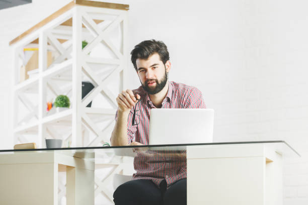 istock Concentrated businessman in office 847473454