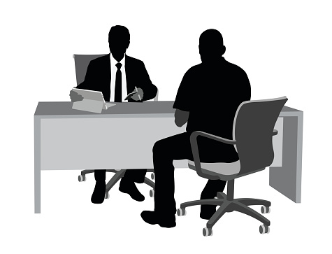 Silhouette illustration of a businessman using his tablet and his client sitting across the desk.