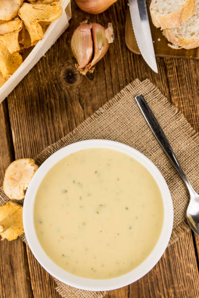 istock Fresh made Creamy Chanterelle Soup on a rustic background 847488048