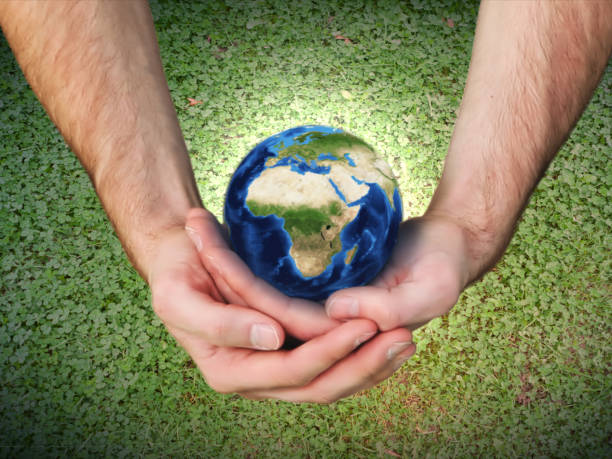 istock Arms holding whole world 847488168