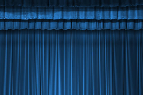 istock dark shadow in blue fabric curtain in theater 847488534