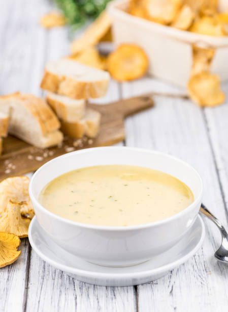istock Chanterelle Soup on wooden background; selective focus 847488976