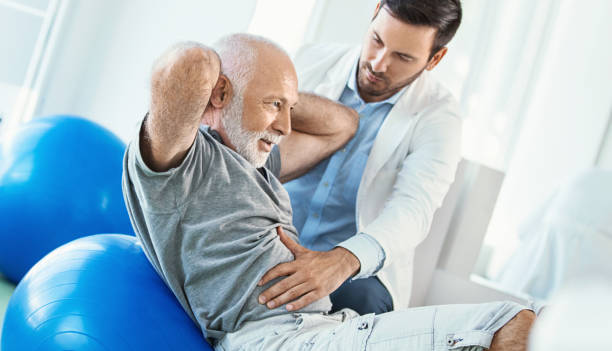 Senior man in physical rehab.