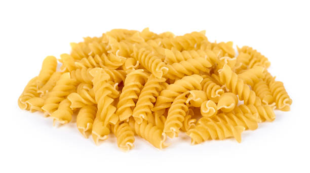 istock pile of spiral pasta isolated on white background 847503480