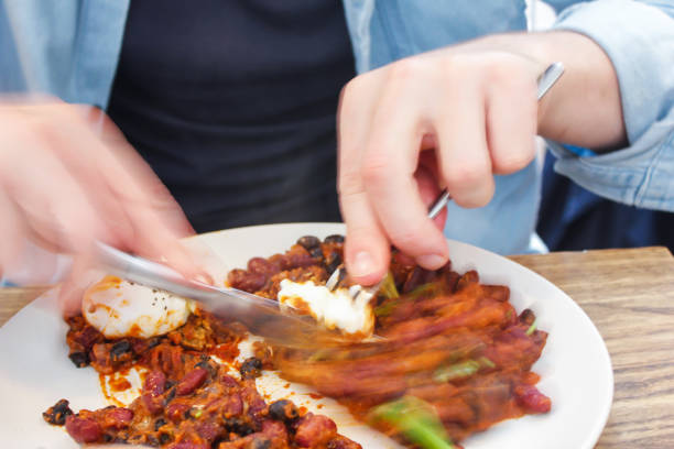 istock Young men enjoying healthy breakfast meal 847516148