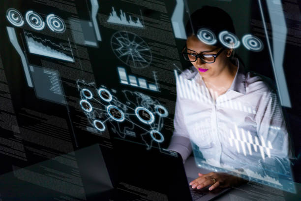 istock woman engineer looking at various information in screen of futuristic interface. 847519068