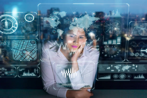 istock woman engineer looking at various information in screen of futuristic interface. 847519100