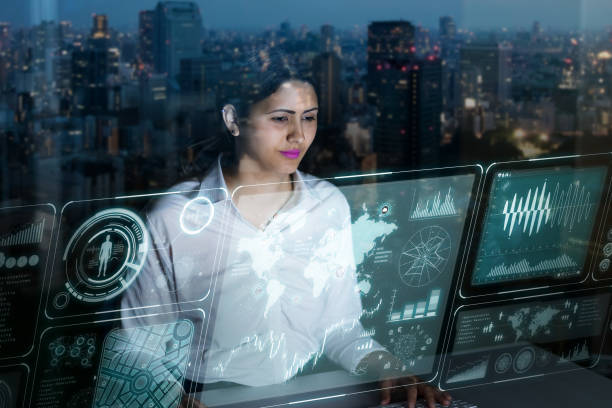 istock woman engineer looking at various information in screen of futuristic interface. 847519126