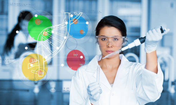 istock Serious chemist working with colourful dna helix diagram inteface 847538424