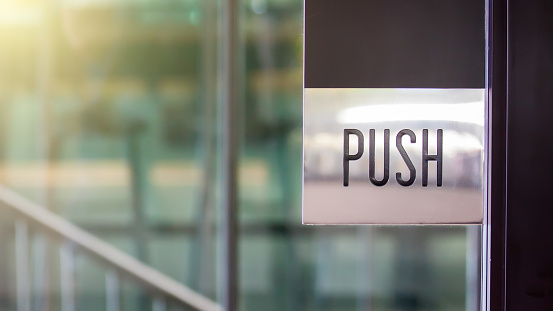 Push symbol at the door.
