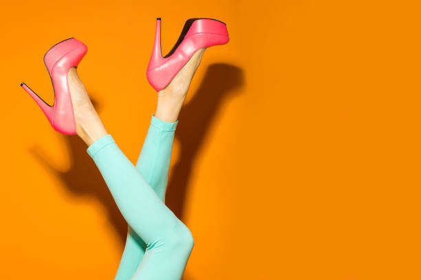 istock Female legs wearing high heels 847559812