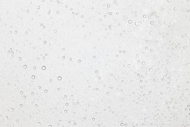 istock Water drops on glass, Rain droplets on glass background. 847560272