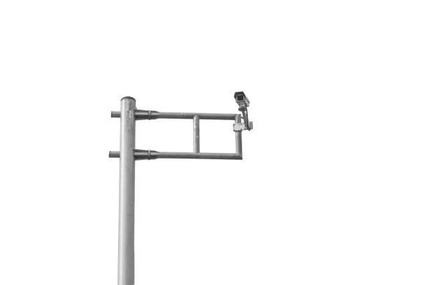 istock traffic police surveillance CCTV security camera pole isolated on white 847567498