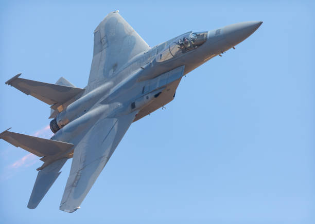 istock F-15 Eagle in a very close view, with afterburners on 847571430