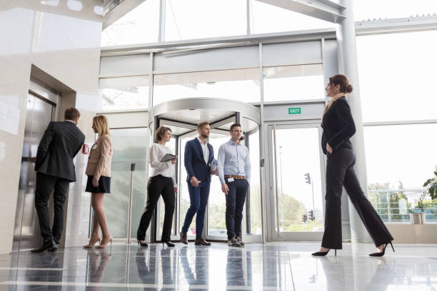 istock Business people walking in office 847579540