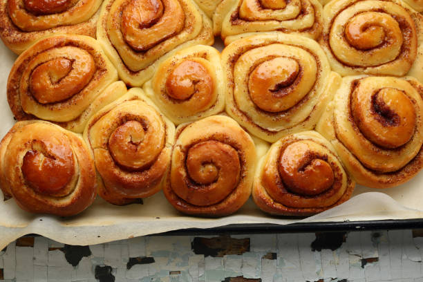 istock Cinnamon pastry buns, food top view 847580152