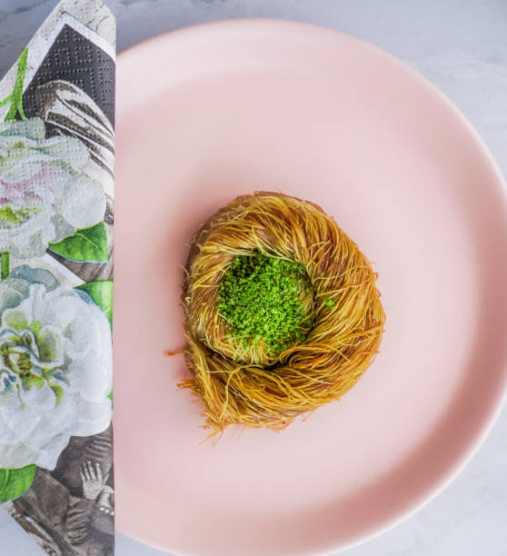 Shredded wheat dessert with pistachio filling