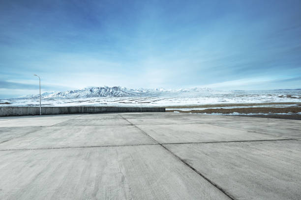 istock empty floor with beautiful snow mountains in blue sky 847582628