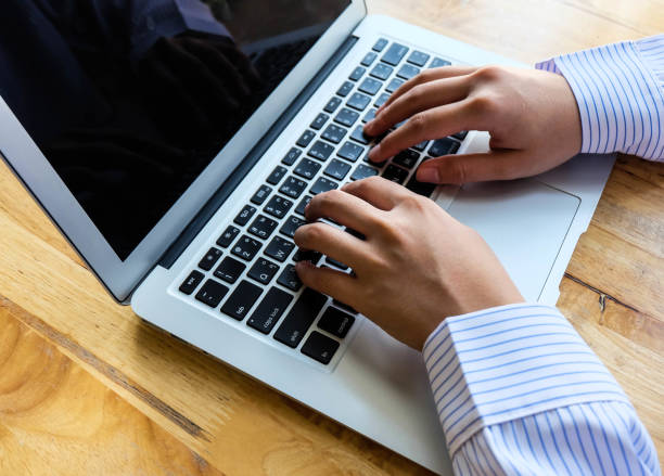istock Woman office worker is typing keyboard, business technology and education concept 847584768
