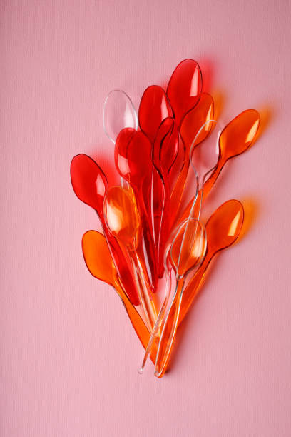 istock Color spoons on pink, food art 847585688
