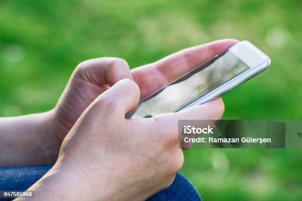 Woman Using Smartphone Stock Photo - Download Image Now - Phone Message, Senior Adult, 30-39 Years