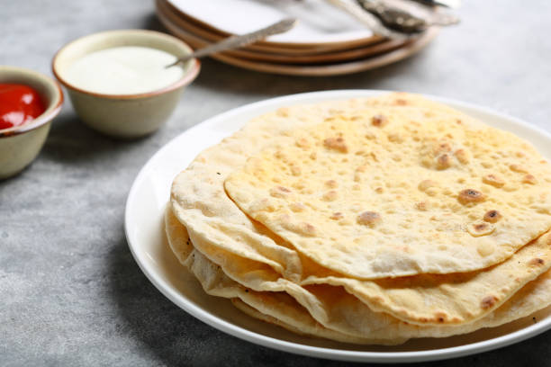 istock Fresh pitas on plate, food closeup 847586368