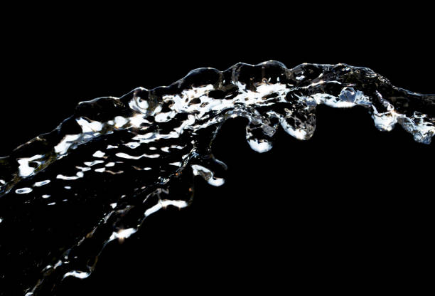istock stream of water on a black background 847589020