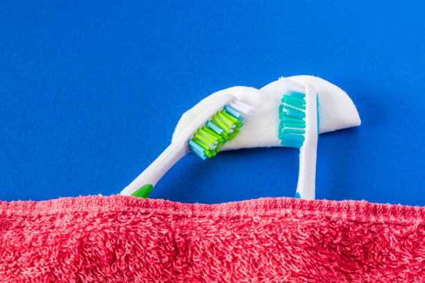 istock Two toothbrushes are turned to rest or sleep. 847590008