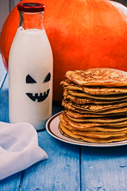istock Pumpkin pancakes and boo milk bottle 847594000