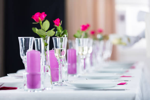 istock Waiter Pouring Champagne Into Glass 847594356