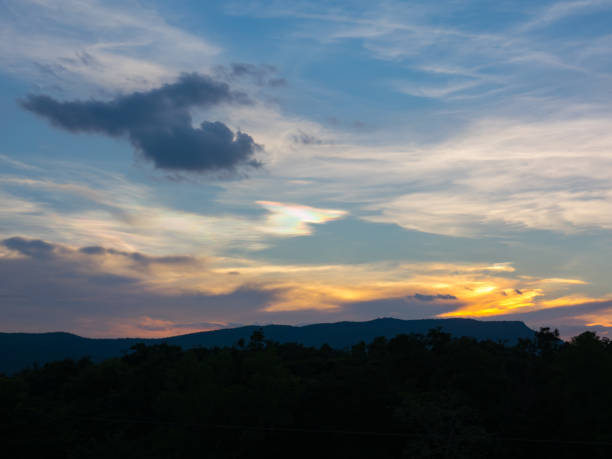 istock Dark mountain and forest on blue sky and cloud on sunset 847601182