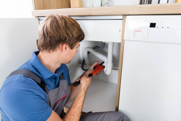 istock Male Plumber Fixing Sink Pipe 847602592