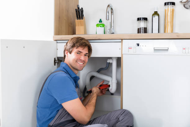 istock Male Plumber Fixing Sink Pipe 847602604