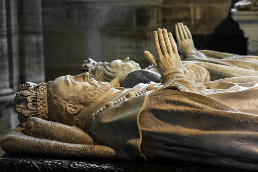 Saint-Denis, France - July 02, 2017: Tombs of Henry II of France and his wife Catherine de' Medici at the Basilica of Saint Denis (Basilique Saint-Denis). Medieval abbey, where the kings of France and their families were buried, is royal necropolis of France.